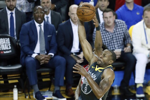 OAKLAND, CA - JUNE 13: Andre Iguodala #9 of the Golden State Warriors goes to the basket against the Toronto Raptors during Game Six of the NBA Finals on June 13, 2019 at ORACLE Arena in Oakland, California. NOTE TO USER: User expressly acknowledges and agrees that, by downloading and/or using this photograph, user is consenting to the terms and conditions of Getty Images License Agreement. Mandatory Copyright Notice: Copyright 2019 NBAE (Photo by Chris Elise/NBAE via Getty Images)