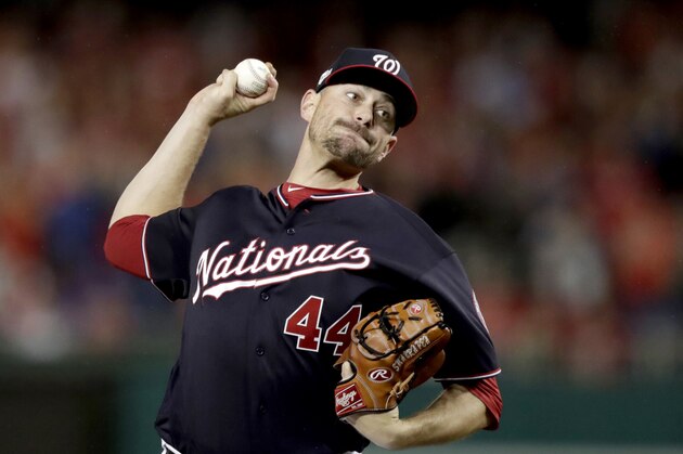 Washington Nationals relief pitcher Daniel Hudson throws a pitch to a Los Angeles Dodgers batter during the ninth inning of Game 4 of a baseball National League Division Series Monday, Oct. 7, 2019, in Washington. (AP Photo/Julio Cortez)