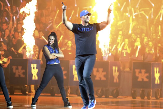Kentucky women's basketball coach Matthew Mitchell dances during Big Blue Madness for the NCAA college basketball season Friday, Oct. 12, 2018, in Lexington, Ky. (AP Photo/James Crisp)