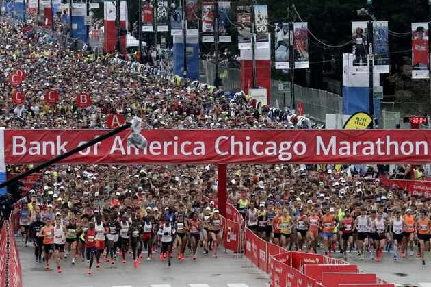 Runners start the Chicago Marathon, Sunday, Oct. 7, 2018, in Chicago. (AP Photo/Nam Y. Huh) Runners start the Chicago Marathon, Sunday, Oct. 7, 2018, in Chicago. (AP Photo/Nam Y. Huh)