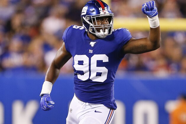 New York Giants outside linebacker Kareem Martin (96) motions on the field during the second quarter of a preseason NFL football game against the Chicago Bears, Friday, Aug. 16, 2019, in East Rutherford, N.J. (AP Photo/Adam Hunger)