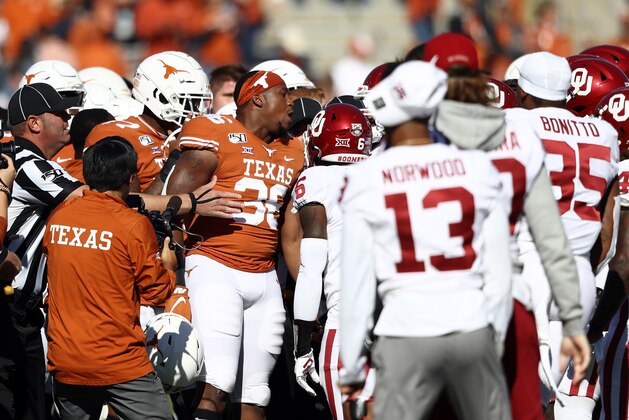 DALLAS, TEXAS - OCTOBER 12:  Jacoby Jones #36 of the Texas Longhorns yells during a scuffle against the Oklahoma Sooners before the 2019 AT&T Red River Showdown at Cotton Bowl on October 12, 2019 in Dallas, Texas. (Photo by Ronald Martinez/Getty Images)