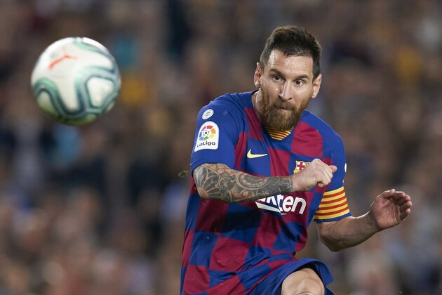 BARCELONA, SPAIN - OCTOBER 06: Lionel Messi of FC Barcelona scores their team's fourth goal after this free kick during the Liga match between FC Barcelona and Sevilla FC at Camp Nou on October 06, 2019 in Barcelona, Spain. (Photo by Quality Sport Images/Getty Images)