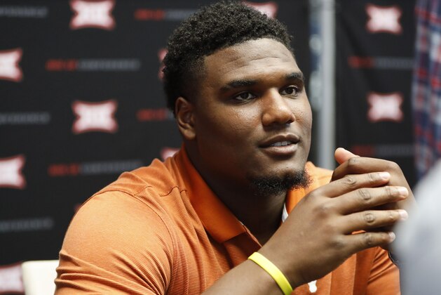 Texas defensive end Malcolm Roach speaks during Big 12 Conference NCAA college football media day Tuesday, July 16, 2019, at AT&T Stadium in Arlington, Texas. (AP Photo/David Kent)