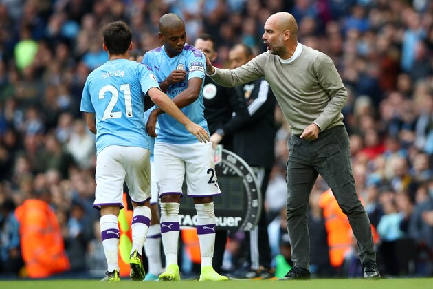 MANCHESTER, ENGLAND - OCTOBER 06: Pep Guardiola, Manager of Manchester City gives instructions as Fernandinho of Manchester City is given the captains armband during the Premier League match between Manchester City and Wolverhampton Wanderers at Etihad Stadium on October 06, 2019 in Manchester, United Kingdom. (Photo by Clive Brunskill/Getty Images)