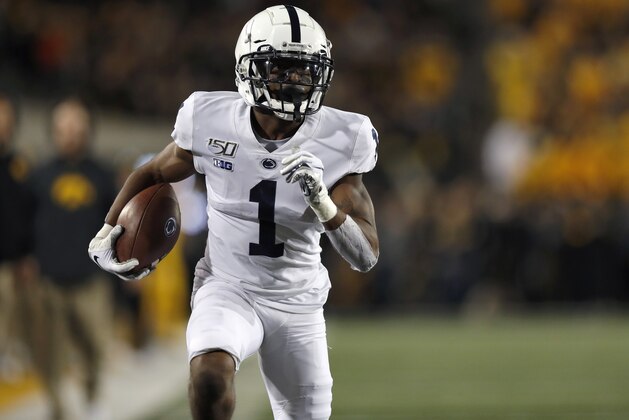 Penn State wide receiver KJ Hamler runs the ball in for a touchdown during the first half of the team's NCAA college football game against Iowa on Saturday, Oct. 12, 2019, in Iowa City, Iowa. (AP Photo/Matthew Putney) Penn State wide receiver KJ Hamler runs the ball in for a touchdown during the first half of the team's NCAA college football game against Iowa on Saturday, Oct. 12, 2019, in Iowa City, Iowa. (AP Photo/Matthew Putney)