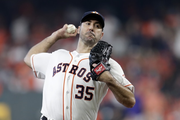 Houston Astros starting pitcher Justin Verlander (35) delivers a pitch against the Tampa Bay Rays in the first inning during Game 1 of a best-of-five American League Division Series baseball game in Houston, Friday, Oct. 4, 2019. (AP Photo/Michael Wyke)