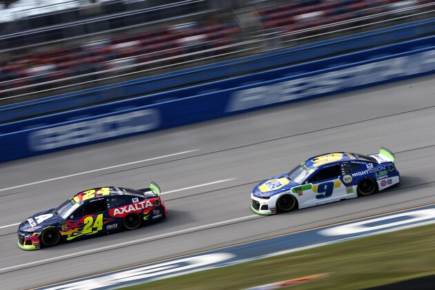 TALLADEGA, ALABAMA - OCTOBER 11: William Byron, driver of the #24 Axalta Chevrolet, leads Chase Elliott, driver of the #9 NAPA Night Vision Chevrolet, during practice for the Monster Energy NASCAR Cup Series 1000Bulbs.com 500 at Talladega Superspeedway on October 11, 2019 in Talladega, Alabama. (Photo by Brian Lawdermilk/Getty Images)