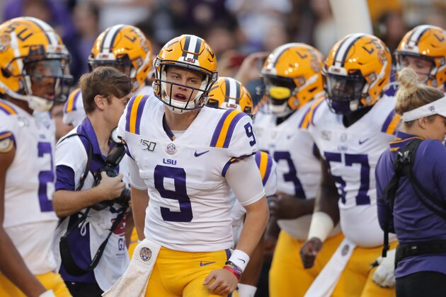 LSU quarterback Joe Burrow (9) warms up before an NCAA college football game against Florida in Baton Rouge, La., Saturday, Oct. 12, 2019. (AP Photo/Bill Feig)