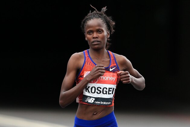 LONDON, ENGLAND - APRIL 28: Brigid Kosgei of Kenya on her way to winning the Women's Elite race during the Virgin Money London Marathon on April 28, 2019 in London, England. (Photo by Stephen Pond/Getty Images)