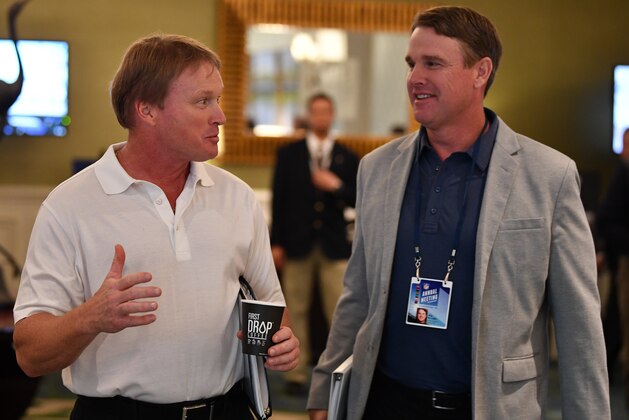 ORLANDO, FL - MARCH 26: Oakland Raiders head coach Jon Gruden and brother and Washington Redskins head coach Jay Gruden attend the 2018 NFL Annual Meetings at the Ritz Carlton Orlando, Great Lakes on March 26, 2018 in Orlando, Florida. (Photo by B51/Mark Brown/Getty Images)