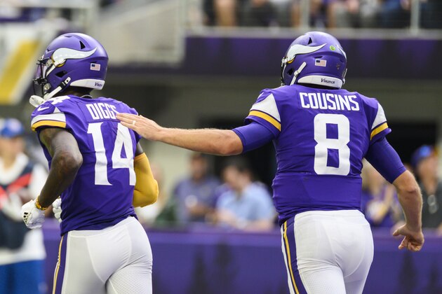 MINNEAPOLIS, MN - SEPTEMBER 08: Kirk Cousins #8 of the Minnesota Vikings pats the back of teammate Stefon Diggs #14 after scoring a touchdown in the second quarter of the game against the Atlanta Falcons at U.S. Bank Stadium on September 8, 2019 in Minneapolis, Minnesota. (Photo by Stephen Maturen/Getty Images)