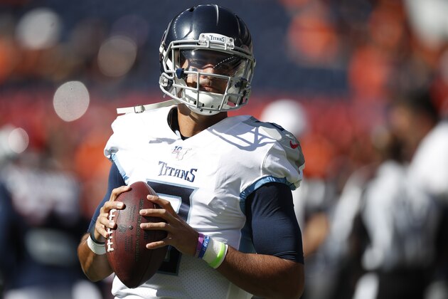 Tennessee Titans quarterback Marcus Mariota warms up before an NFL football game against the Denver Broncos, Sunday, Oct. 13, 2019, in Denver. (AP Photo/David Zalubowski)
