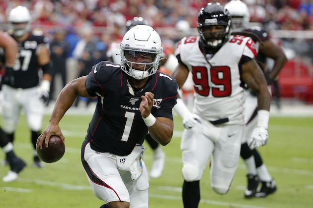 Arizona Cardinals quarterback Kyler Murray (1) scrambles as Atlanta Falcons defensive end Adrian Clayborn (99) pursues during the first half of an NFL football game, Sunday, Oct. 13, 2019, in Glendale, Ariz. (AP Photo/Rick Scuteri)