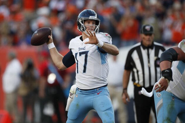 Tennessee Titans quarterback Ryan Tannehill throws a pass during the second half of an NFL football game against the Denver Broncos, Sunday, Oct. 13, 2019, in Denver. (AP Photo/David Zalubowski)