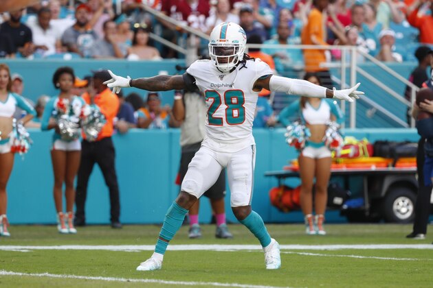 Miami Dolphins strong safety Bobby McCain (28) gestures after a play, during the second half at an NFL football game against the Miami Dolphins, Sunday, Oct. 13, 2019, in Miami Gardens, Fla. (AP Photo/Wilfredo Lee)