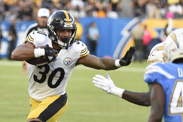 CARSON, CA - OCTOBER 13: James Conner #30 of the Pittsburgh Steelers rushes for yardage against the Los Angeles Chargers in the first quarter at Dignity Health Sports Park October 13, 2019 in Carson, California. (Photo by Denis Poroy/Getty Images)