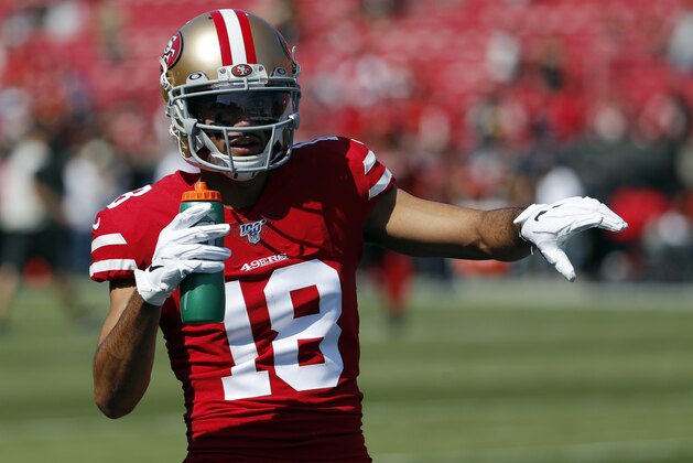 San Francisco 49ers' Dante Pettis (18) warms up before an NFL football game against the Los Angeles Rams Sunday, Oct. 13, 2019, in Los Angeles. (AP Photo/John Locher)