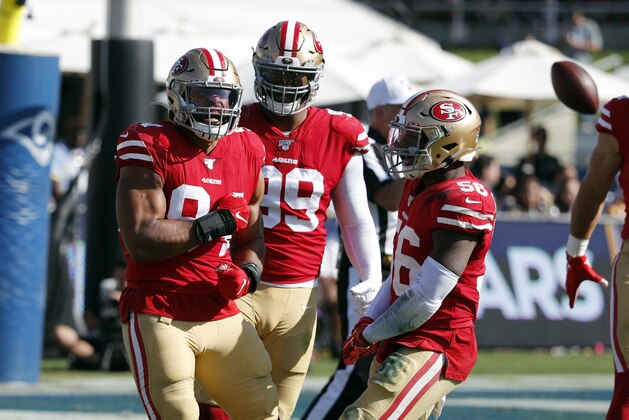 San Francisco 49ers defensive end Solomon Thomas, left, celebrates after sacking Los Angeles Rams quarterback Jared Goff during the second half of an NFL football game Sunday, Oct. 13, 2019, in Los Angeles. (AP Photo/John Locher)