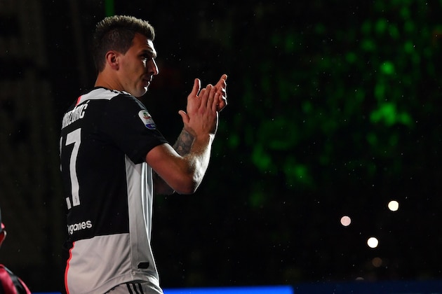 TURIN, ITALY - MAY 19: Mario Mandzukic of Juventus attends the awards ceremony after winning the Serie A Championship during the Serie A match between Juventus and Atalanta BC on May 19, 2019 in Turin, Italy. (Photo by Tullio M. Puglia/Getty Images)