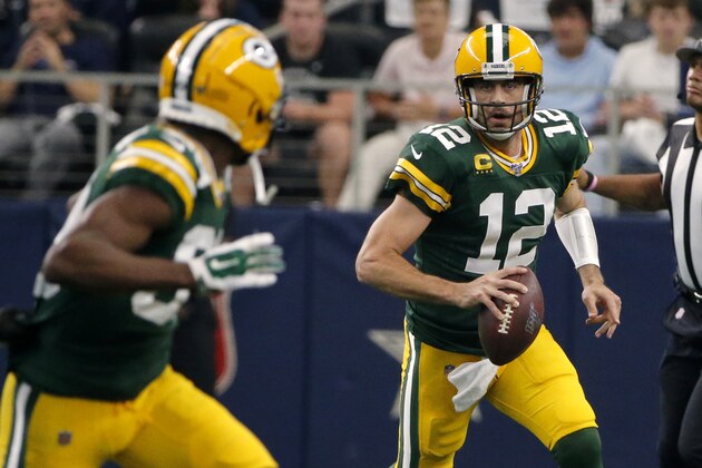 Green Bay Packers quarterback Aaron Rodgers (12) looks to throw a pass in the first half of an NFL football game against the Dallas Cowboys in Arlington, Texas, Sunday, Oct. 6, 2019. (AP Photo/Michael Ainsworth)