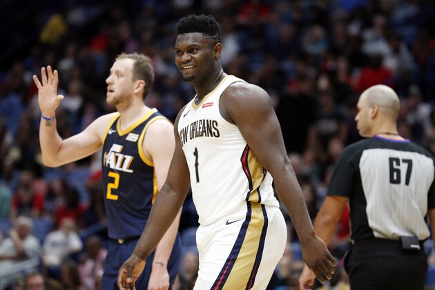 New Orleans Pelicans forward Zion Williamson (1) in the first half of a preseason NBA basketball game against the Utah Jazz in New Orleans, Friday, Oct. 11, 2019. (AP Photo/Tyler Kaufman)