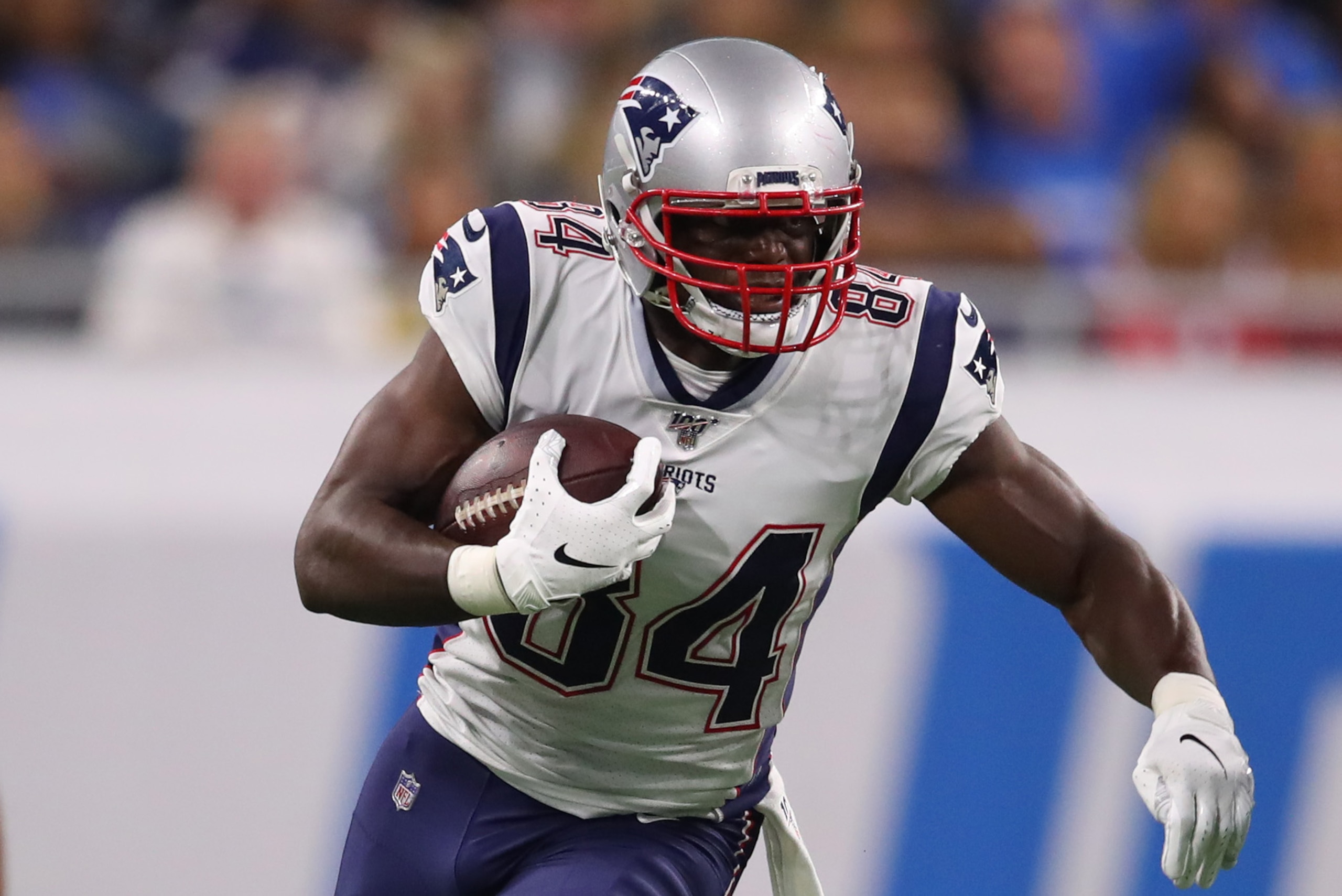 DETROIT, MICHIGAN - AUGUST 08: Benjamin Watson #84 of the New England Patriots looks for yards after a second quarter catch while playing the Detroit Lions during a preseason game at Ford Field on August 08, 2019 in Detroit, Michigan. (Photo by Gregory Shamus/Getty Images)