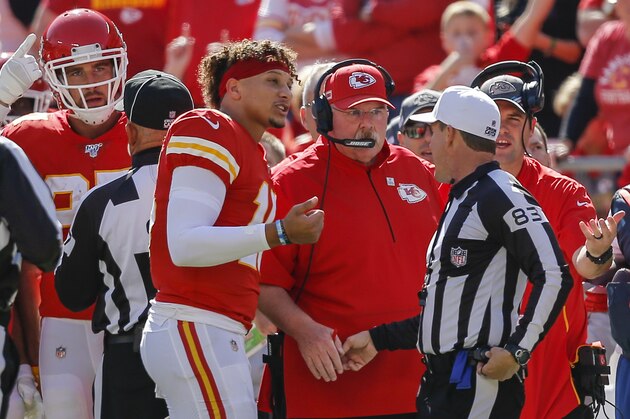 KANSAS CITY, MO - OCTOBER 13: Patrick Mahomes #15 of the Kansas City Chiefs and head coach Andy Reid of the Kansas City Chiefs argue a pass interference call in the second quarter with referee Shawn Hochuli #83 against the Houston Texans at Arrowhead Stadium on October 13, 2019 in Kansas City, Missouri. (Photo by David Eulitt/Getty Images)