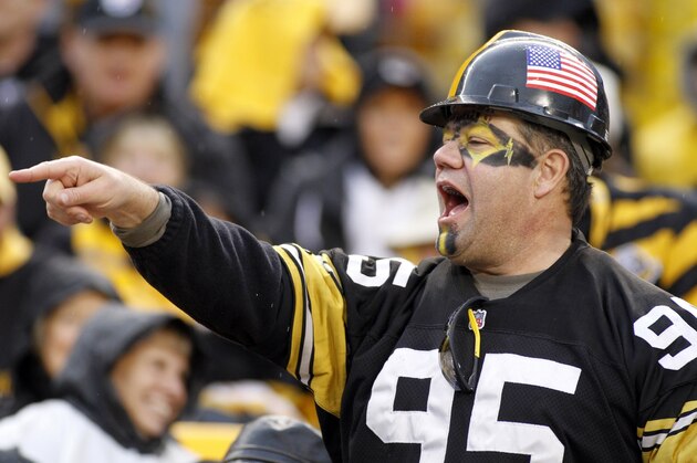 PITTSBURGH, PA - DECEMBER 9:  A Pittsburgh Steelers fans cheers against the San Diego Chargers during the game on December 9, 2012 at Heinz Field in Pittsburgh, Pennsylvania.  (Photo by Justin K. Aller/Getty Images)