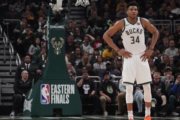 Milwaukee Bucks' Giannis Antetokounmpo pauses during the first half of Game 2 of the NBA Eastern Conference basketball playoff finals against the Toronto Raptors Friday, May 17, 2019, in Milwaukee. (AP Photo/Morry Gash)
