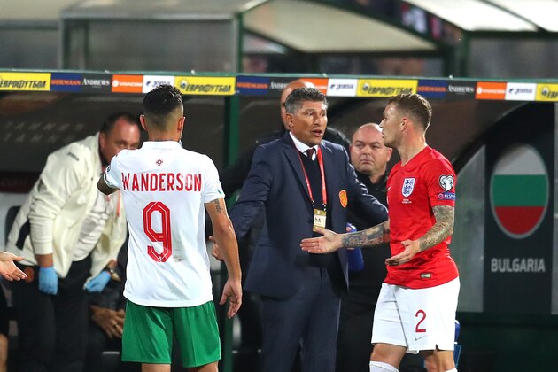 SOFIA, BULGARIA - OCTOBER 14: Krasimir Balakov, Manager of Bulgaria speaks with Kieran Trippier of England during the UEFA Euro 2020 qualifier between Bulgaria and England on October 14, 2019 in Sofia, Bulgaria. (Photo by Catherine Ivill/Getty Images)