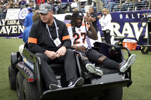 Cincinnati Bengals cornerback Dre Kirkpatrick (27) sits on the back of a cart while being taking off the field after an injury against the Baltimore Ravens during the first half of a NFL football game Sunday, Oct. 13, 2019, in Baltimore. (AP Photo/Nick Wass)