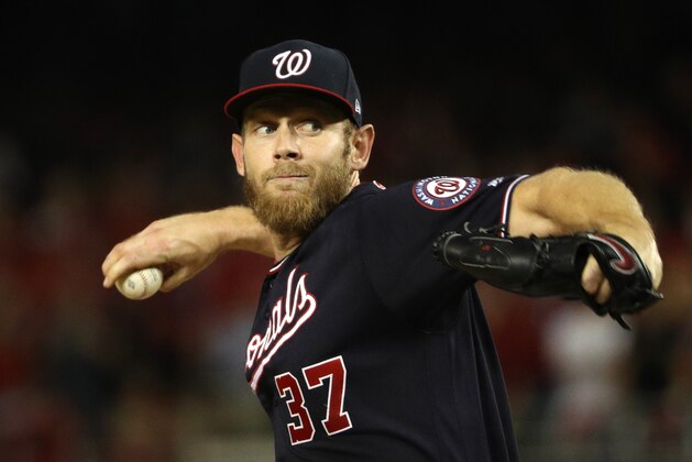 WASHINGTON, DC - OCTOBER 14: Stephen Strasburg #37 of the Washington Nationals delivers in the first inning of game three of the National League Championship Series against the St. Louis Cardinals at Nationals Park on October 14, 2019 in Washington, DC. (Photo by Patrick Smith/Getty Images)