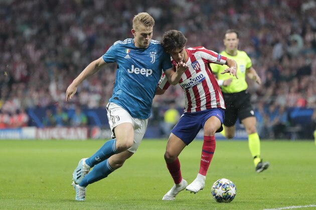 Atletico Madrid's Joao Felix, right, and Juventus' Matthijs de Ligt vie for the ball during the Champions League Group D soccer match between Atletico Madrid and Juventus at the Wanda Metropolitano stadium in Madrid, Spain, Wednesday, Sept. 18, 2019. (AP Photo/Bernat Armangue)