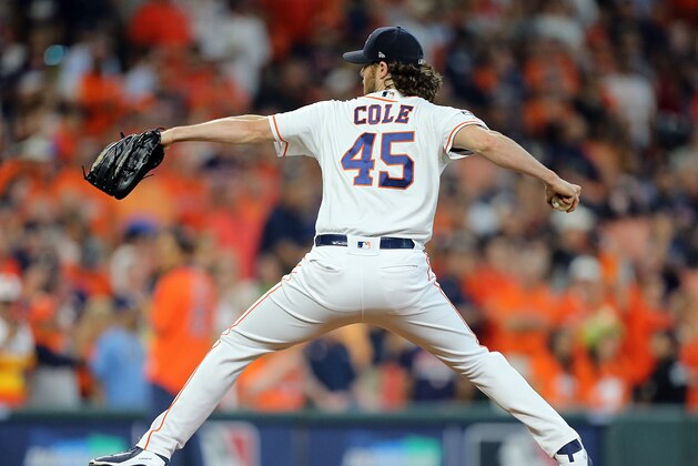 HOUSTON, TEXAS - OCTOBER 10: Gerrit Cole #45 of the Houston Astros pitches during Game 5 of the ALDS against the Tampa Bay Rays at Minute Maid Park on October 10, 2019 in Houston, Texas. Houston advances with a 6-1 win. (Photo by Bob Levey/Getty Images)