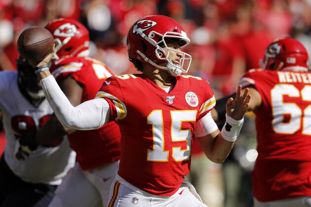 Kansas City Chiefs quarterback Patrick Mahomes (15) throws a pass during the second half of an NFL football game against the Houston Texans in Kansas City, Mo., Sunday, Oct. 13, 2019. (AP Photo/Colin E. Braley)