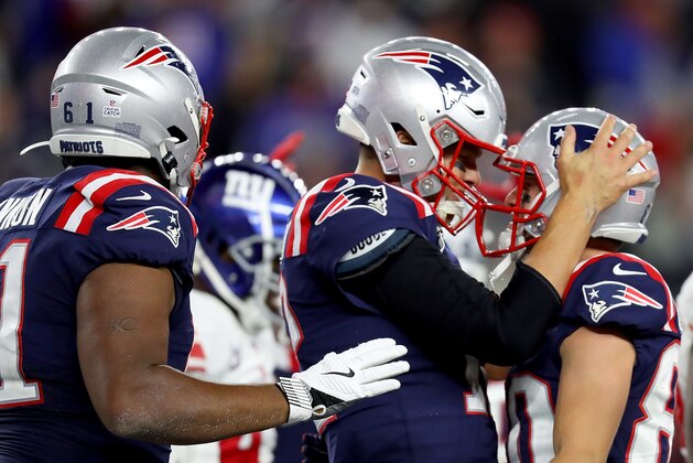 FOXBOROUGH, MASSACHUSETTS - OCTOBER 10: Tom Brady #12 of the New England Patriots celebrates after scoring a one yard touchdown against the New York Giants during the fourth quarter in the game at Gillette Stadium on October 10, 2019 in Foxborough, Massachusetts. (Photo by Maddie Meyer/Getty Images)