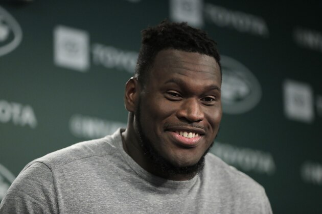New York Jets offensive guard Kelechi Osemele speaks to reporters at the team's NFL football training facility in Florham Park, N.J., Tuesday, June 4, 2019. (AP Photo/Julio Cortez)