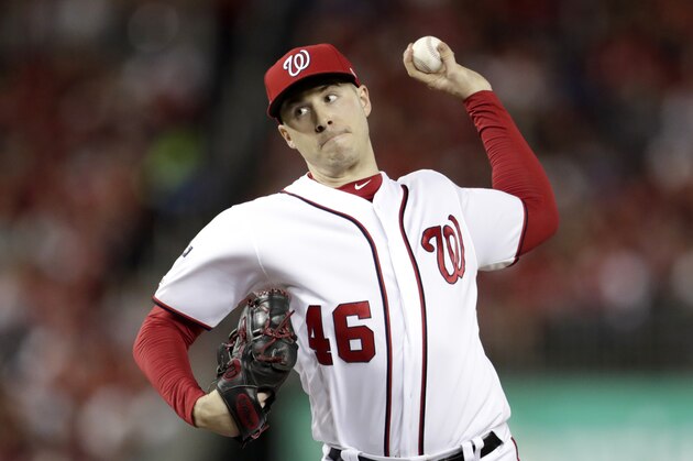 Washington Nationals pitcher Patrick Corbin throws a pitch to a Los Angeles Dodgers batter during the fifth inning in Game 3 of a baseball National League Division Series Sunday, Oct. 6, 2019, in Washington. (AP Photo/Julio Cortez)