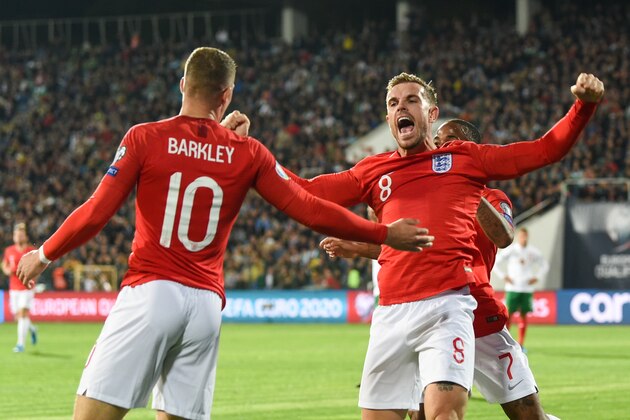 England's midfielder Jordan Henderson celebrates the goal of Ross Barkley during the UEFA Euro 2020 qualifier Group A football match between Bulgaria and England in Sofia, Bulgaria on October 14, 2019. (Photo by NIKOLAY DOYCHINOV / AFP) (Photo by NIKOLAY DOYCHINOV/AFP via Getty Images)