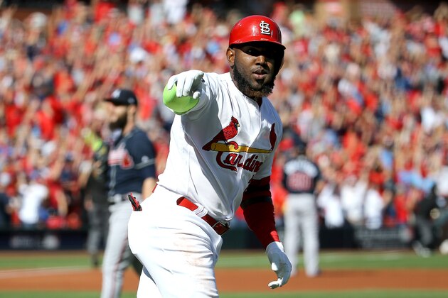 ST LOUIS, MISSOURI - OCTOBER 07:  Marcell Ozuna #23 of the St. Louis Cardinals celebrates after hitting a solo home run against the Atlanta Braves during the first inning in game four of the National League Division Series at Busch Stadium on October 07, 2019 in St Louis, Missouri. (Photo by Scott Kane/Getty Images)