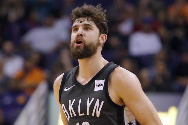 Brooklyn Nets forward Joe Harris (12) in the first half during an NBA basketball game against the Phoenix Suns, Tuesday, Nov. 6, 2018, in Phoenix. (AP Photo/Rick Scuteri)