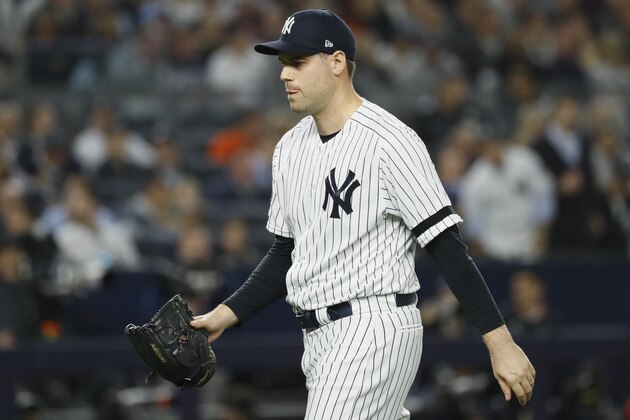 New York Yankees relief pitcher Adam Ottavino leaves the game during the seventh inning in Game 3 of baseball's American League Championship Series against the Houston Astros Tuesday, Oct. 15, 2019, in New York. (AP Photo/Matt Slocum)