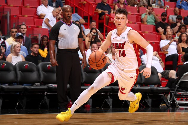 MIAMI, FL - OCTOBER 14: Tyler Herro #14 of the Miami Heat handles the ball against the Atlanta Hawks during a pre-season game on October 14, 2019 at American Airlines Arena in Miami, Florida. NOTE TO USER: User expressly acknowledges and agrees that, by downloading and or using this Photograph, user is consenting to the terms and conditions of the Getty Images License Agreement. Mandatory Copyright Notice: Copyright 2019 NBAE (Photo by Issac Baldizon/NBAE via Getty Images)