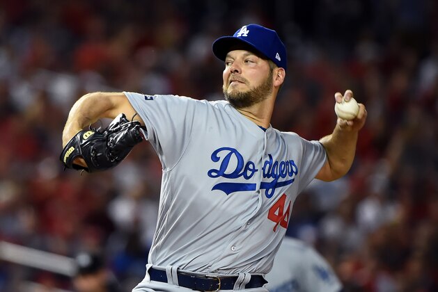 WASHINGTON, DC - OCTOBER 07: Rich Hill #44 of the Los Angeles Dodgers delivers in the first inning against the Washington Nationals in game four of the National League Division Series at Nationals Park on October 07, 2019 in Washington, DC. (Photo by Will Newton/Getty Images)