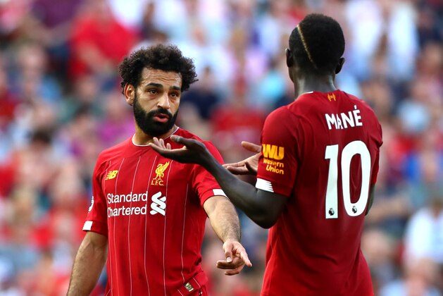 LIVERPOOL, ENGLAND - AUGUST 24: Sadio Mane and Mohamed Salah of Liverpool interact during the Premier League match between Liverpool FC and Arsenal FC at Anfield on August 24, 2019 in Liverpool, United Kingdom. (Photo by Chloe Knott - Danehouse/Getty Images)