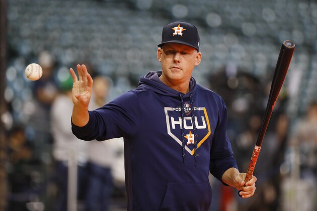 Houston Astros manager AJ Hinch hits during batting practice before Game 1 of baseball's American League Championship Series against the New York Yankees Saturday, Oct. 12, 2019, in Houston. (AP Photo/Matt Slocum)
