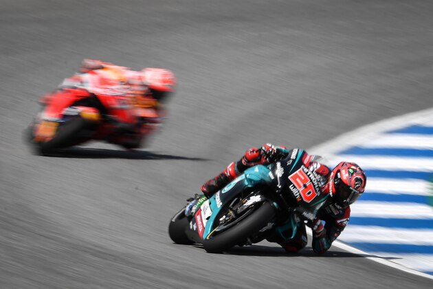 Petronas Yamaha SRT French rider Fabio Quartararo rides during the MotoGP race for the Thailand Grand Prix at Buriram International Circuit in Buriram on October 6, 2019. (Photo by Lillian SUWANRUMPHA / AFP) (Photo by LILLIAN SUWANRUMPHA/AFP via Getty Images)