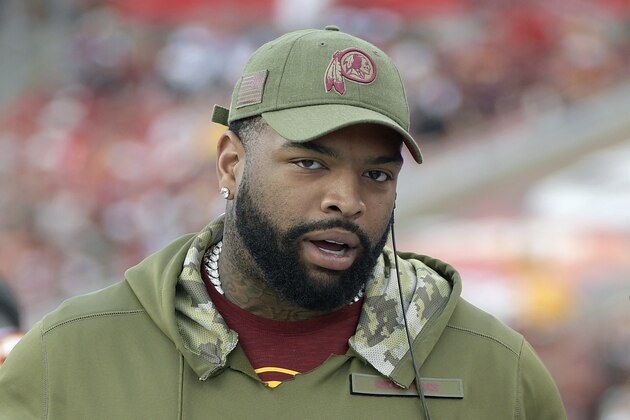 FILE - In this Nov. 11, 2018, file photo, Washington Redskins offensive tackle Trent Williams is shown on the sideline during the second half of an NFL football game against the Tampa Bay Buccaneers, in Tampa, Fla. Williams did not report to training camp Thursday, July 25, 2019, amid a contract dispute. (AP Photo/Phelan M. Ebenhack, File)