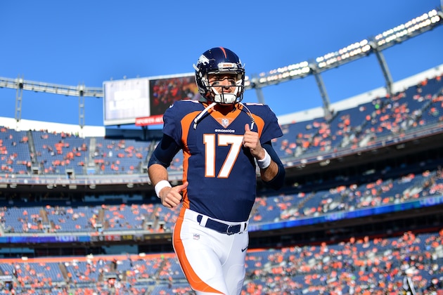 DENVER, CO - DECEMBER 10:  Quarterback Brock Osweiler #17 of the Denver Broncos runs off the field after player warm ups before a game against the New York Jets at Sports Authority Field at Mile High on December 10, 2017 in Denver, Colorado. (Photo by Dustin Bradford/Getty Images)